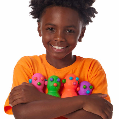 Panic Pete Lifestyle with boy hugging all 4 Panic Pete colors