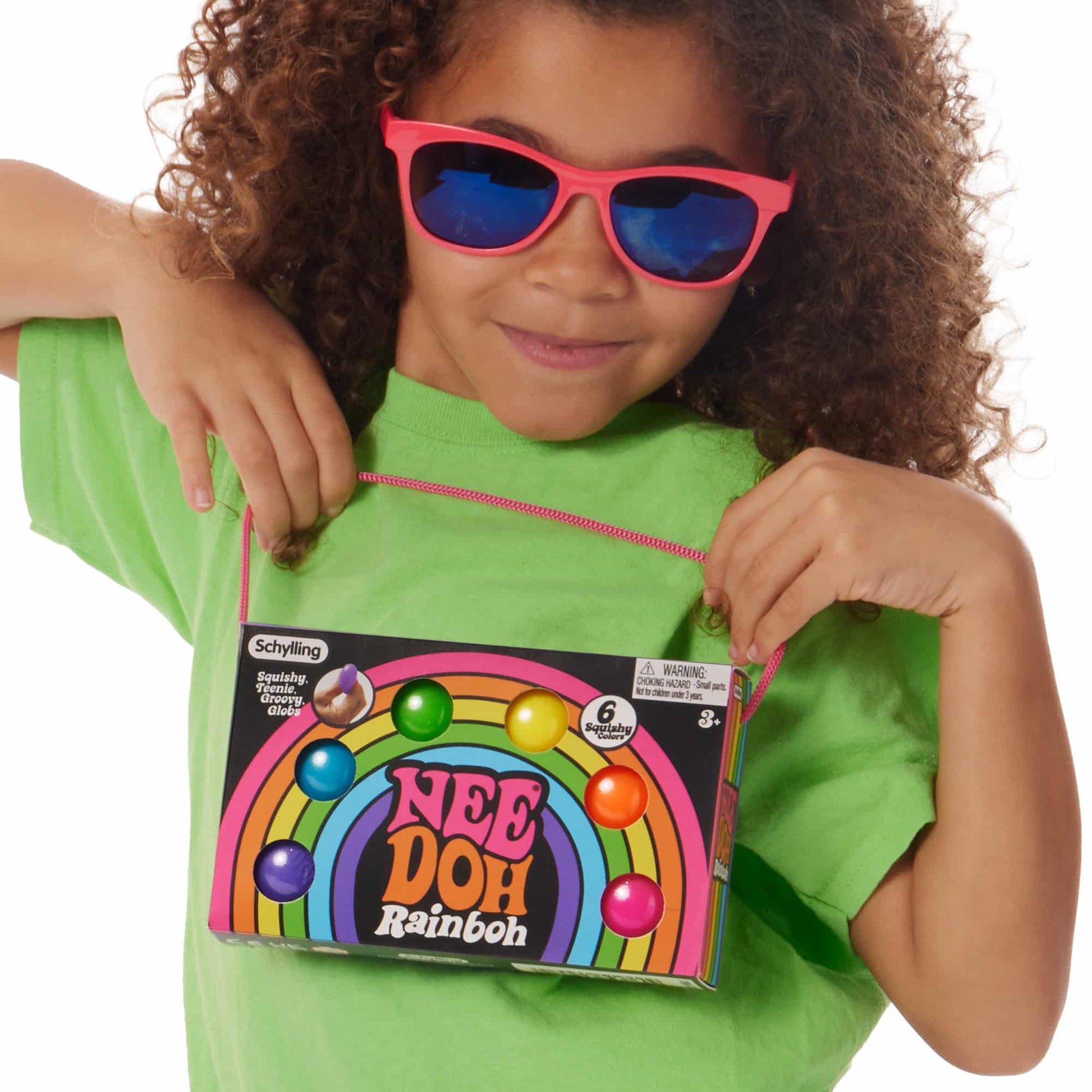 Girl holding the Rainboh packaging